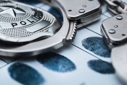 Miami Badge and Fingerprints Criminal Defense Image